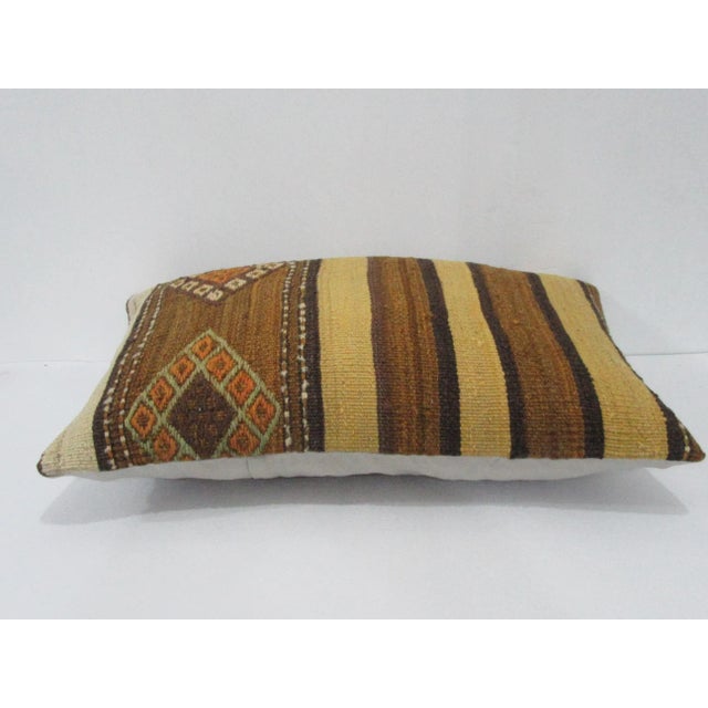 Handmade decorative pillow cover made from a vintage Turkish kilim rug. Backed with good quality cotton fabric. Pillow...