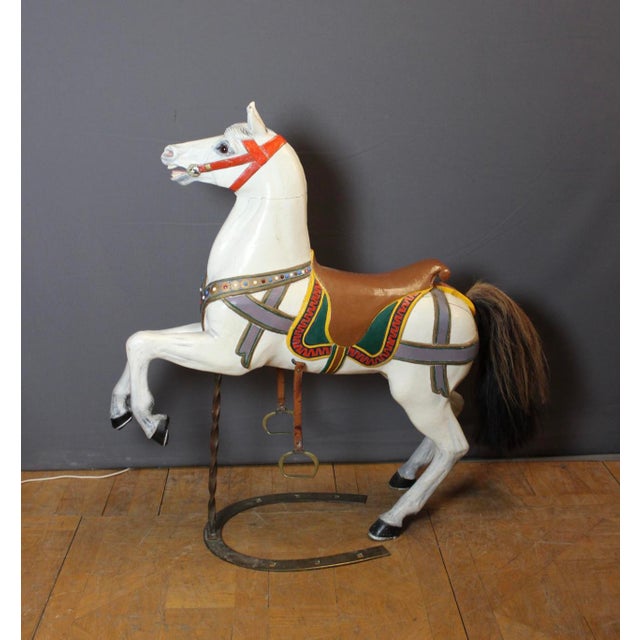 Carved polychrome wooden carousel horse, horseshoe base, probably German, circa 1900, in very good condition