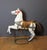 Carved polychrome wooden carousel horse, horseshoe base, probably German, circa 1900, in very good condition