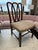 One Beaton dining chair (side chair model) made by Dessin Fournir in the US. The chair feature a walnut frame that is hand...