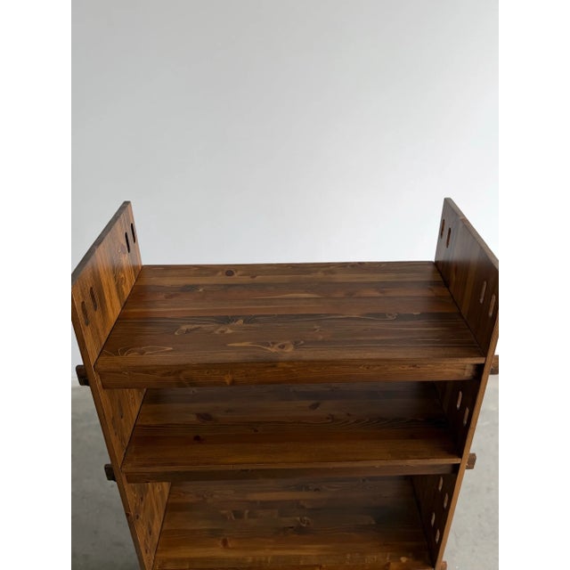 W38 H66 D16 SHELF H16.5(adjustable) The “Antique Vintage Solid Wooden Arts & Crafts Pegged Bookcase” features distinctive...