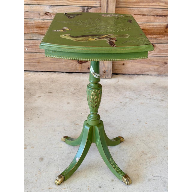 A truly one-of-a-kind antique pedestal table reimagined by a local artist, featuring an enchanting hand-painted and...