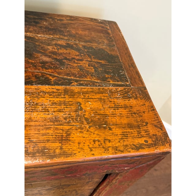 Antique Asian Console A storage solution with style and a story to tell. Aged wood with distressed paint and a subtly...