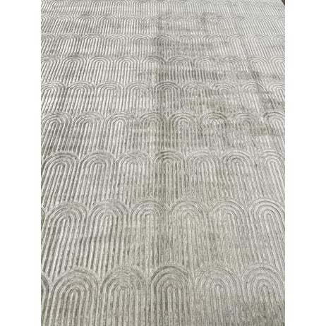 Beautiful handloom rug. Made of viscose & cotton with very modern design and colors, this extremely gorgeous rug is an...