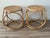 A stylish pair of vintage bentwood side tables featuring sculptural circular loop bases and woven rattan tops. Inspired by...