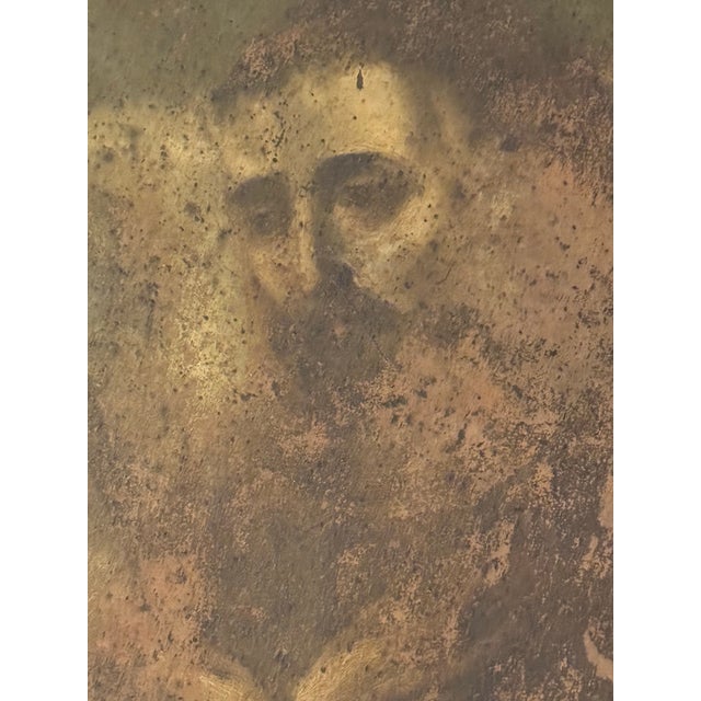 A painting of a Mexican saint in an ornate antique frame. Possibly depicting Juan Diego, known for his vision of Our Lady...