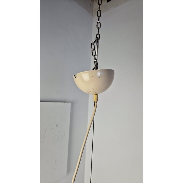 Vintage Black and White Pendant Lamp by Achille and Pier Giacomo Castiglioni for Flos, 1960s, in Very Good conditions....