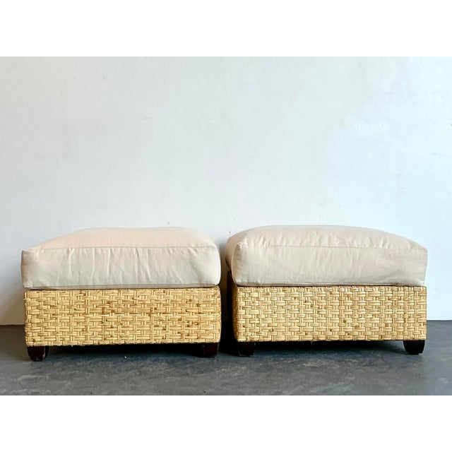 This exceptional pair of vintage ottomans, crafted in the iconic style of McGuire Furniture, brings a refined coastal...