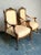 This exquisite pair of armchairs, presented in the elegant Fauteuil style, exemplifies sophisticated Neoclassical and...