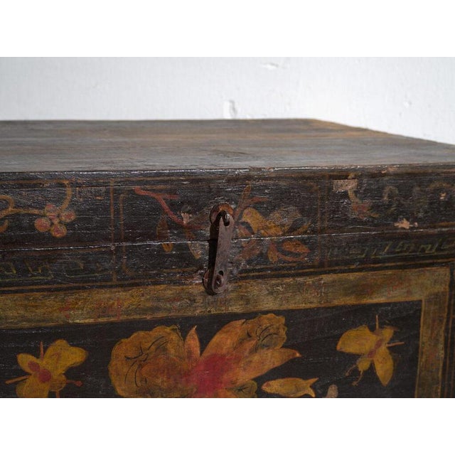 Chinese solid wood chest with original polychrome decoration, crafted between the late Qing dynasty and the early...