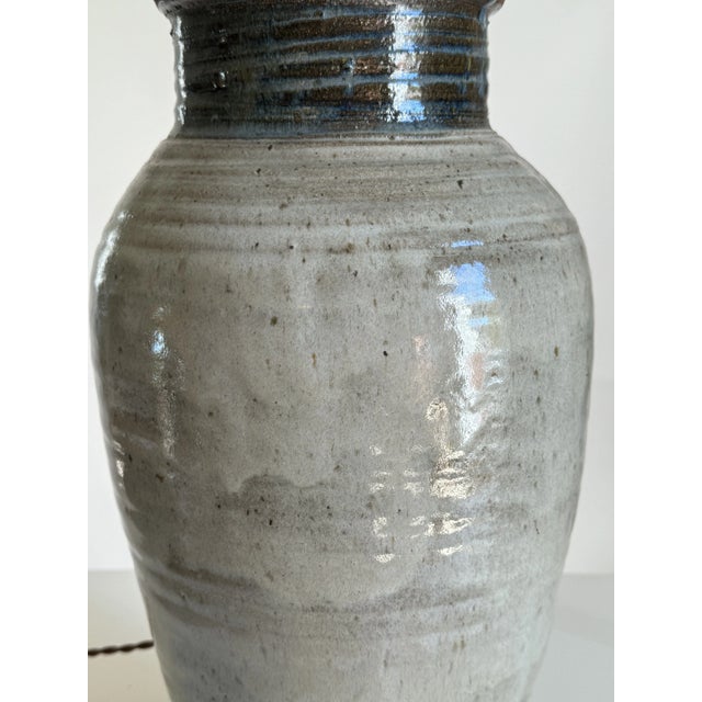 Mid-century studio pottery stoneware table lamp, with organic, muscular profile and a drip glaze that would be beautiful...