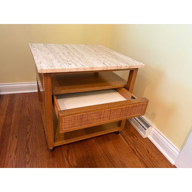 A sophisticated 1960s side table designed by celebrated American furniture designer Harvey Probber, featuring a...