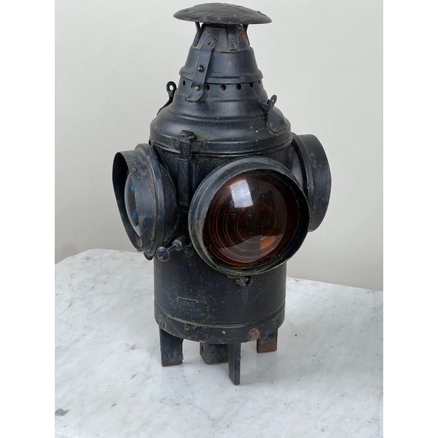 This antique railroad lantern is a striking survivor from the golden age of American rail travel, made by the well-known...