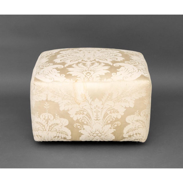 Modern White Silk Damask Upholstered Ottoman, on brass casters. 15.5" H x 25.5" W x 25.5" D. Provenance: From a Forest...