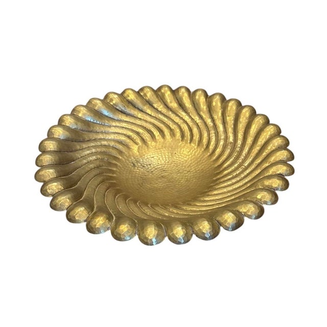 A stunning, Mid-Century bowl by Egidio Casagrande. Features hammered brass over copper in a swirled design, resting atop...