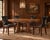 Distinctive set of four regency style leather dining chairs designed by Ralph Lauren. The chairs feature a hardwood frame...