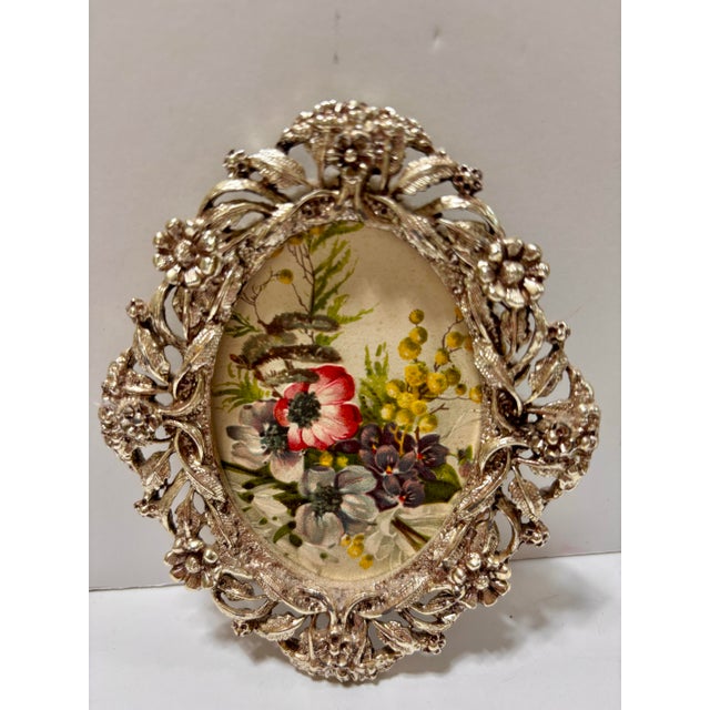 Beautiful set of 2 vintage ornate picture frames featuring intricate filigree metalwork, floral motifs, and an elegant...