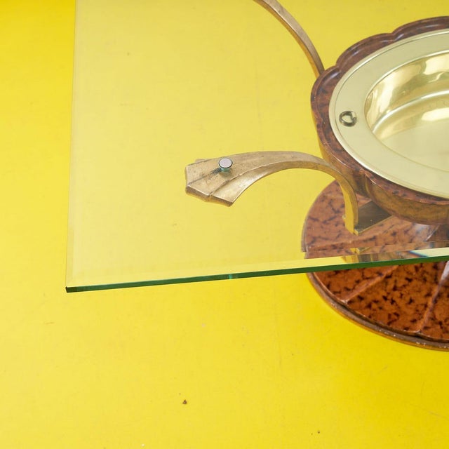 Discover the timeless elegance of this art deco coffee table, a unique piece combining sinuous shapes and fine materials....