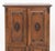Renaissance Revival Walnut Linen Press, the two doors with carved crest opening to two shelves and hooks above two drawers...