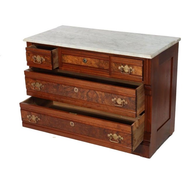 Antique Eastlake Walnut Five Drawer Marble Top Dresser C1890 Measures - 30"H x 40.75"W x 19.75"D A fine example of...