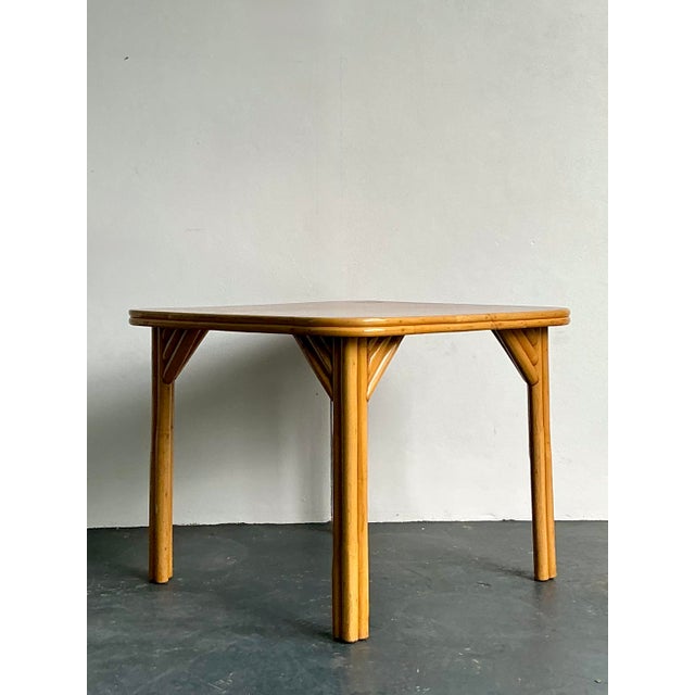 This exceptional 1950s game table set is a quintessential example of mid-century tropical modernism, perfect for those...