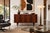 Designed by Carlo Jensen for Poul Hundevad in Denmark during the 1960s, this Danish modern credenza / sideboard is a...