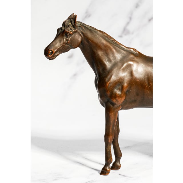 A superb example of early 20th-century American decorative arts, this circa 1920s horse sculpture by Jennings Brothers...