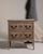 A distinguished example of 19th-century French provincial craftsmanship, this substantial chest of drawers is fashioned...