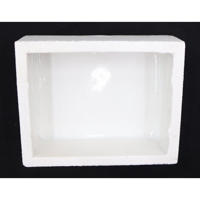 Flush mount rectangular bathroom shallow soap dish made of white porcelain over ceramic. Made by Fairfacts Co. Inc. Good...