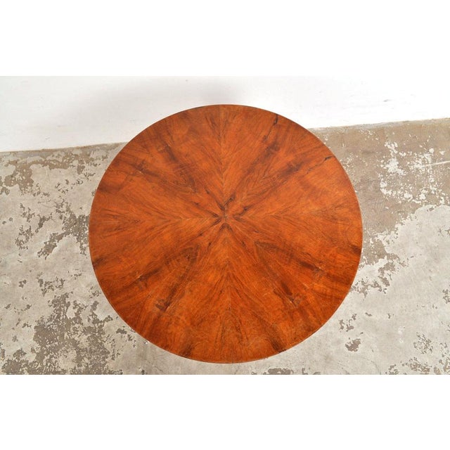 Nice model side table with burr walnut veneer top in gloss. There is room for reading material under the top. Oak legs....