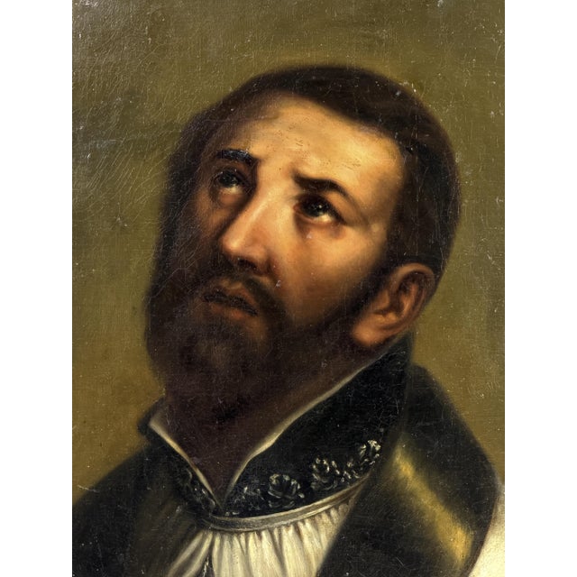A deeply expressive 19th century oil on canvas portrait traditionally identified as Saint Francis Xavier, one of the most...