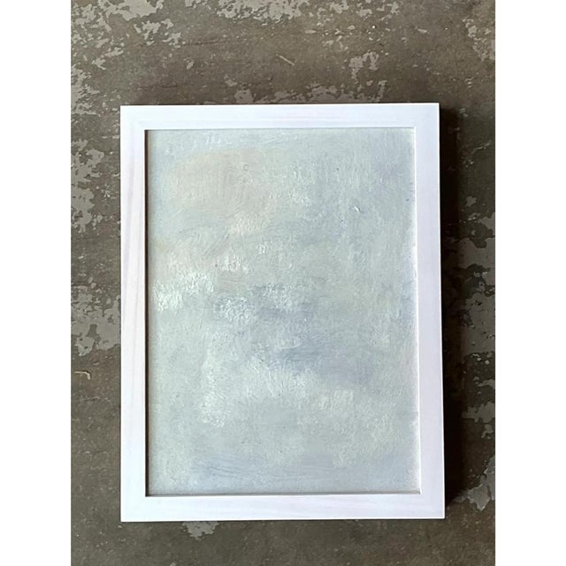 This vintage abstract expressionist painting is executed on wood in a soft, ethereal palette of pale greys and muted...