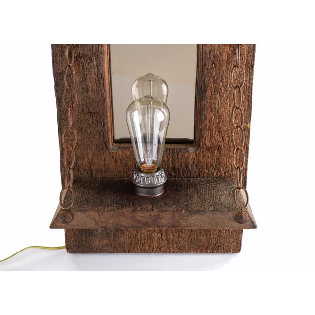 Vintage Art:Threshold of Light Medium: Reclaimed wood, mirror, metal chains, and illuminated bulb Dimensions: 12 x 24.5 x...