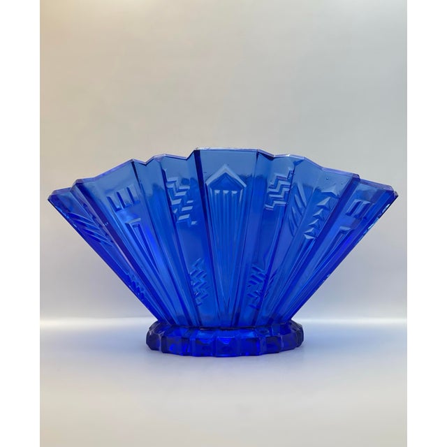 A striking fan shaped cobalt blue console bowl decorated in an interesting geometric pattern made by the L.E. Smith Glass...