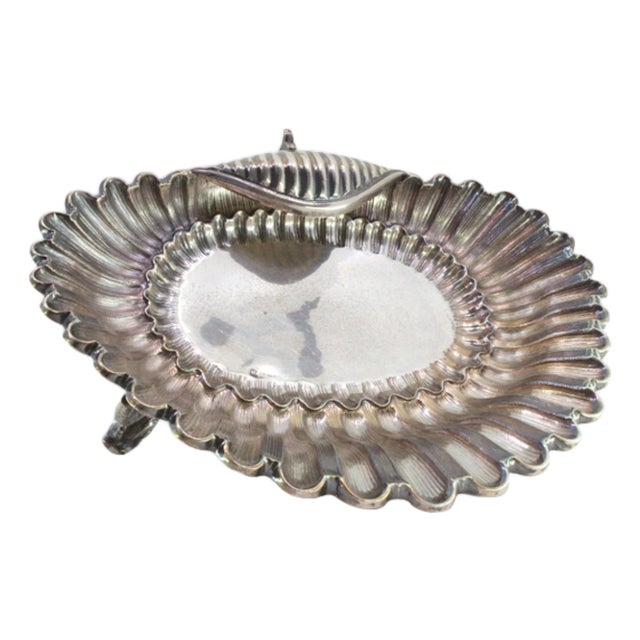 Shell-Shaped Silver Fruit Bowl with Reliefs and Fish-Shaped Feet For Sale