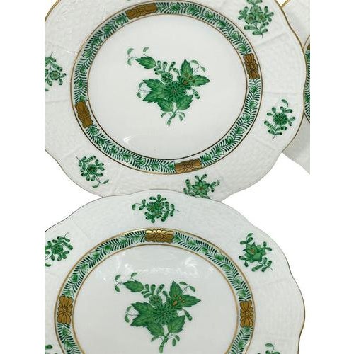 Herend Hungary porcelain plates with a basket weave rim with the pattern "Chinese Bouquet Apponyi Green". The plates are...