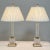 Pair Mid-Century Neoclassical Cut Crystal & Brass Table Lamps feature a design influenced by neoclassical architecture,...
