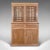 This is a very tall antique glazed cupboard. An English, pine sideboard dresser or larder cabinet, dating to the early...