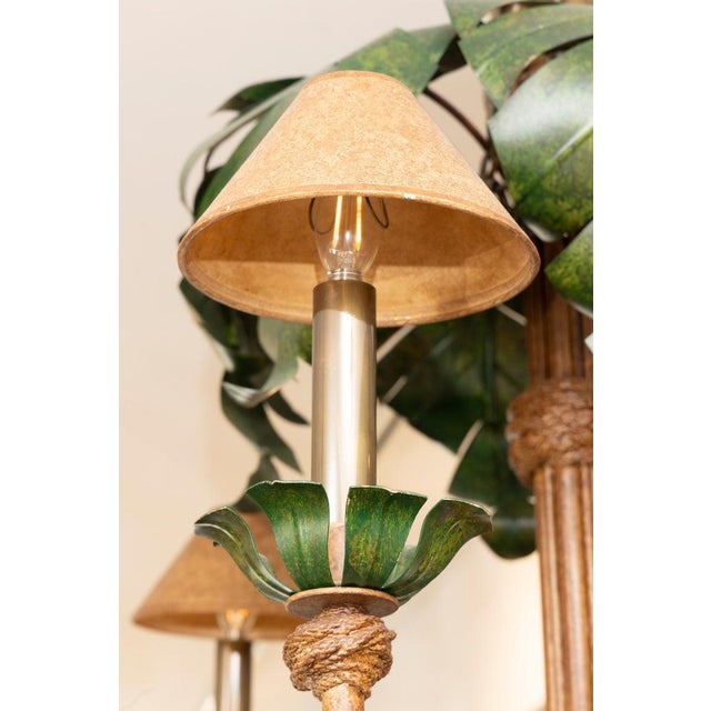 This is a whimsical and distinctly tropical, this six-light chandelier is crafted in the form of a stylized palm tree. The...
