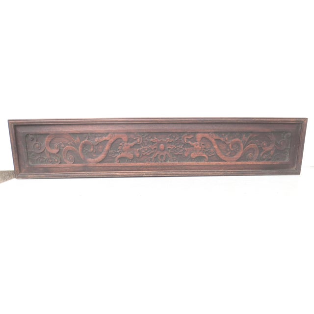 Mid 20th hardwood carved scroll box. Beautifully carved in a scrolling pattern with dragon details showing emerging from...