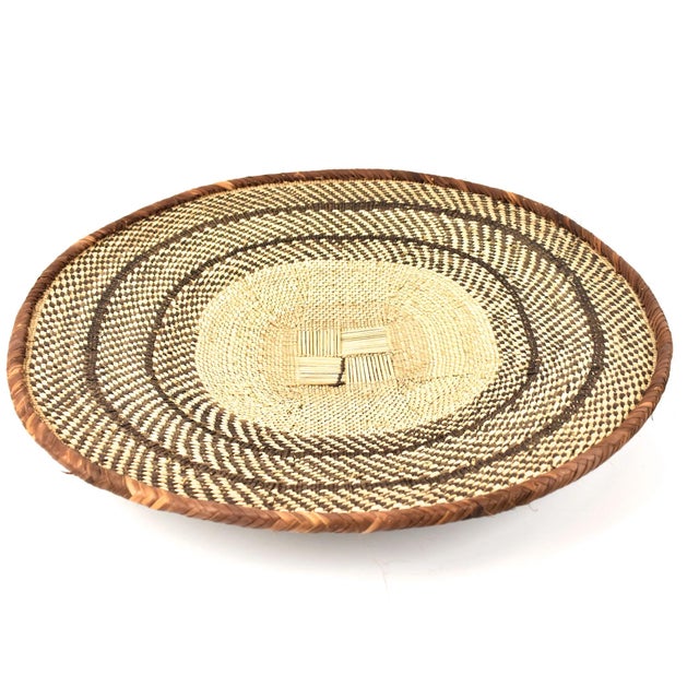 Tonga Binga baskets are traditional handcrafted baskets made by the Tonga women of Binga district in Zimbabwe. Crafted...