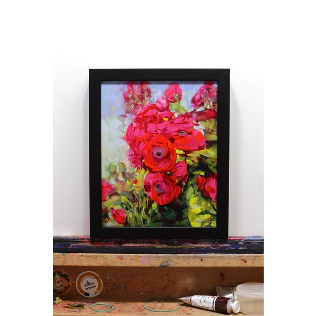 This oil on panel artwork features a vibrant arrangement of blooming roses, their deep red petals contrasting against a...
