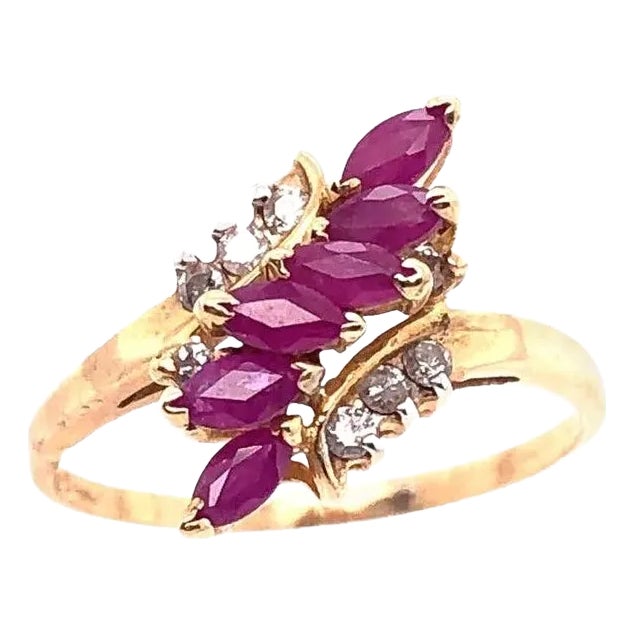 14 Karat Yellow Gold Contemporary Ruby Ring With Diamond Accents For Sale