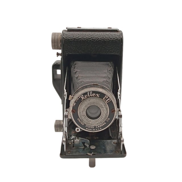 This self-standing vintage Rollex 20 folding camera used 120 or 620 roll film to produce simple snapshots. A beautiful...