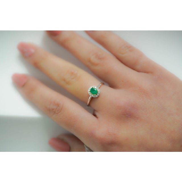 Natural Oval Cut Emerald and Diamond Halo Ring, Set in 18K Solid White Gold. The perfect natural gemstone emerald ring...