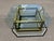 Fine brass profile base 3/4” thick chamfered edge glass top coffee table with square cut corners, manufactured in Italy...