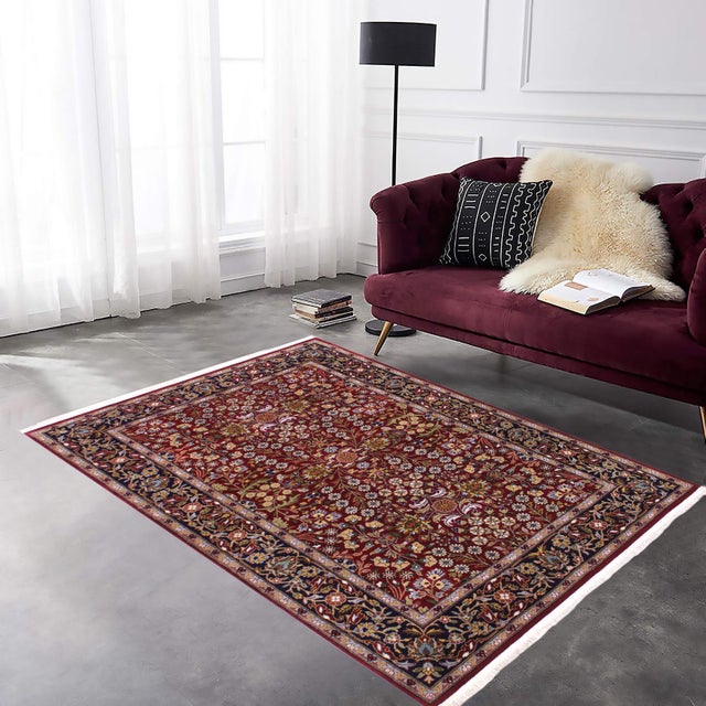 Decorate your home with this ravishing rug hand-knotted and designed with great attention to detail by skilled artisans in...