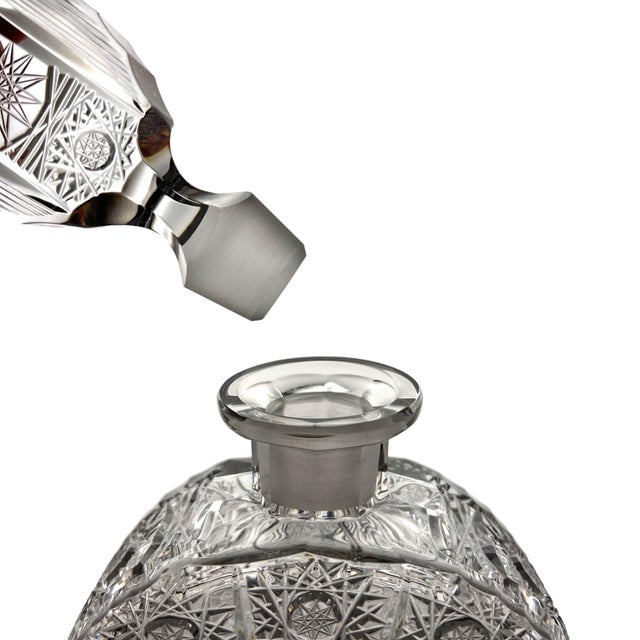 1970s hand-carved Bohemian crystal banjo decanter with starburst cut glass and original stopper. Banjo bottle silhouette...
