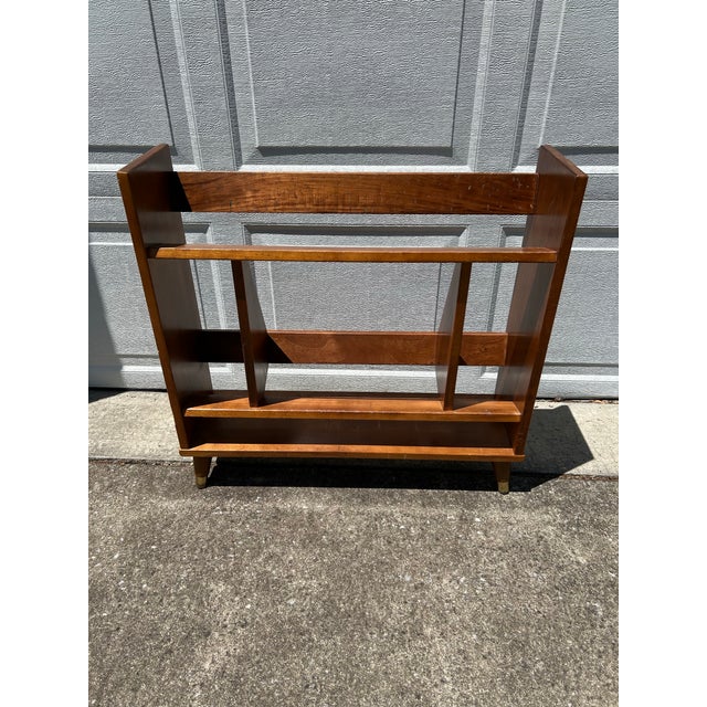 This is an awesome petite three shelf bookcase. The top two shelves are angled beautifully to show off the spines of the...