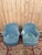 A pair of faux toadstool armchairs, fully upholstered in duck-egg blue velvet, with the characteristic rounded, enveloping...